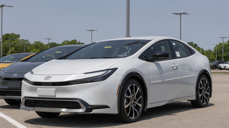 White Toyota Prius in a parking lot