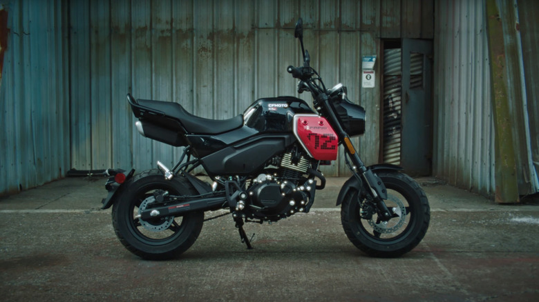 CFMoto Papio 72 with a red fairing, side view