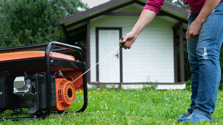 Starting a generator on the grass