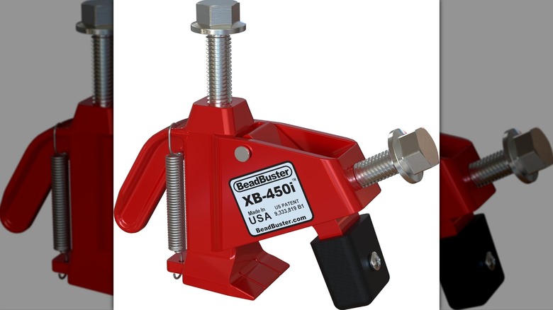 A BeadBuster XB-450i Bead Breaker.