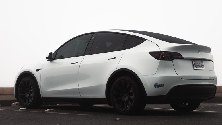 Tesla Model Y parked driver rear