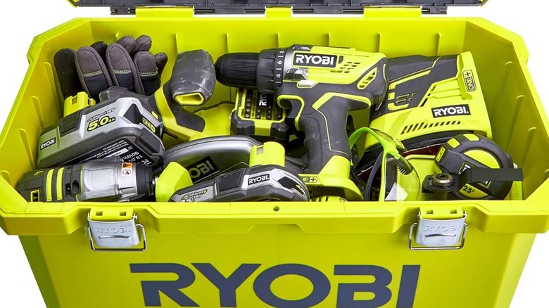 Ryobi tools stored in a Ryobi tool box.