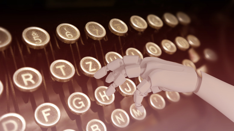 A robot hand at a typewriter