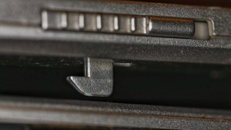 The catch for a laptop lid.