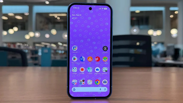 Google Pixel 10a standing upright on a desk