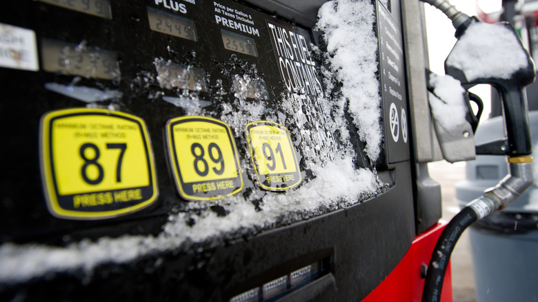 A fuel dispenser covered in snow