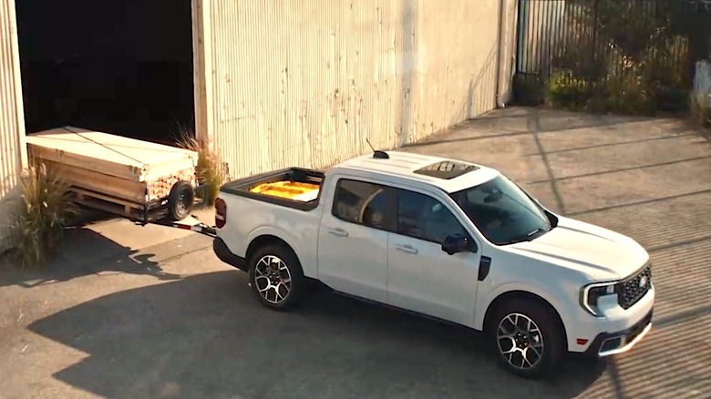 Ford Maverick hauling lumber