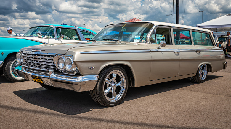 5th gen Chevrolet Bel Air wagon parked outside at a car show