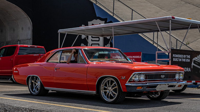 Side shot of a red '65 Chevelle Malibu SS 396