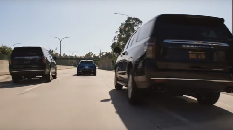Mattel Suburbans chasing Barbie