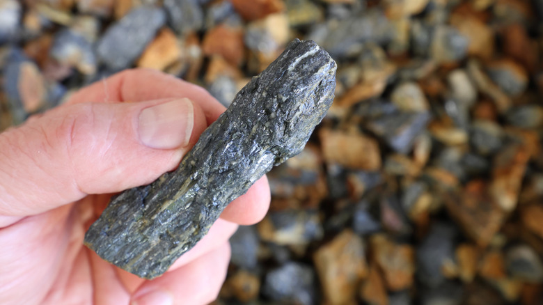 Chunk of antimony in a person's hand