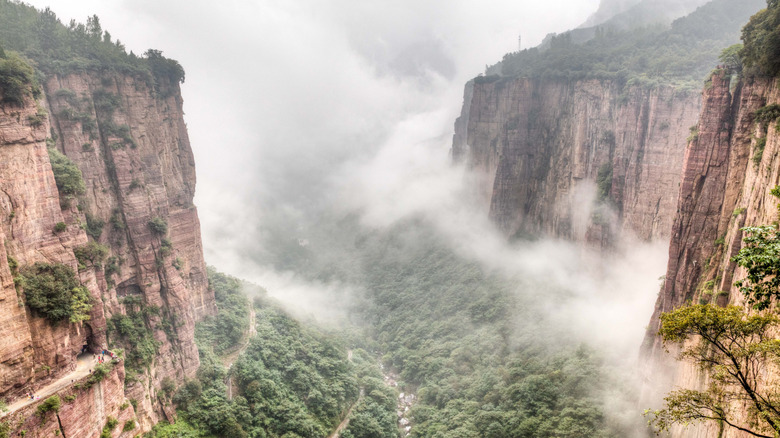 Guoliang Tunnel Road as seen from above misty valley