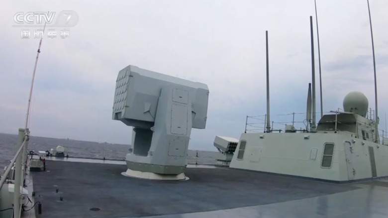 A Chinese Type 055 guided-missile destroyer launches a missile