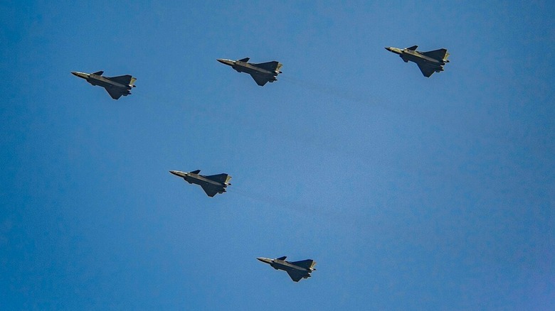 Chinese J-20A aircraft flying in formation.