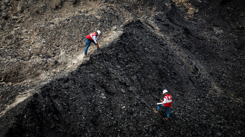 Workers at a coal mine in Indonesia