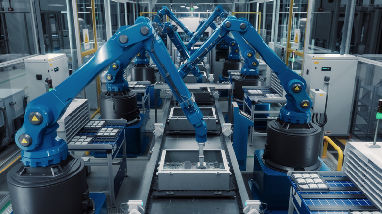 An automated factory production line ran by blue robots.