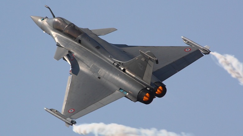 A Dassault Rafale flying against a blue sky