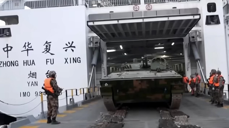 Front view of tank being driven off Ro-Ro ferry in China.