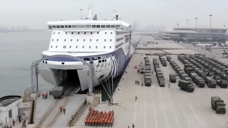 Overhead view of military vehicles being loaded onto Ro-Ro Ferry.
