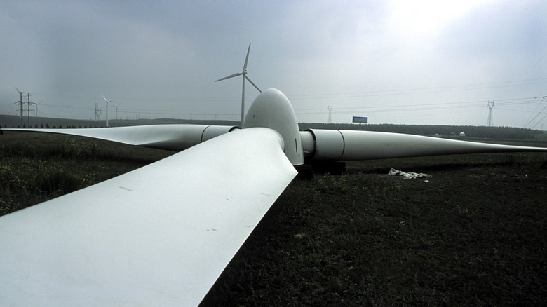 Offshore wind farm turbine being repaired.