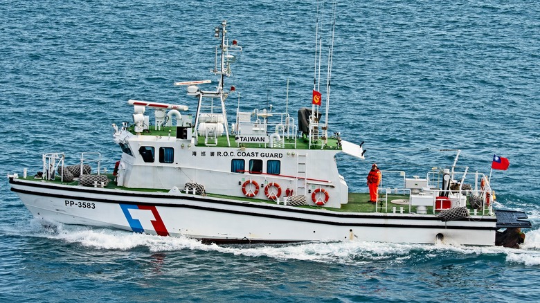 A Taiwanese Coast Guard vessel moving through a harbor