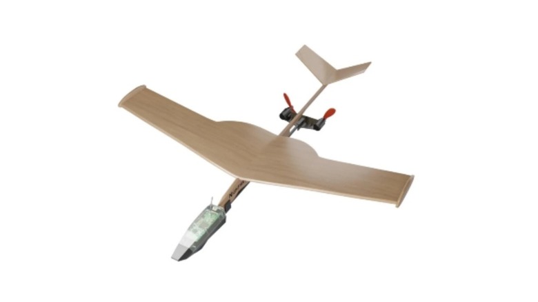 Wood toy plane with electronic device on its nose