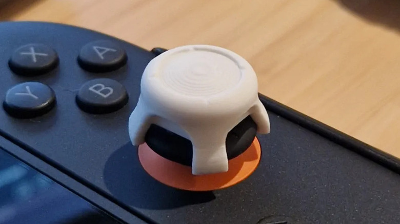 Joystick extender on a Nintendo Switch Joy-Con