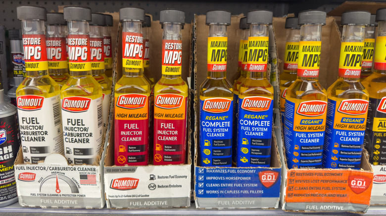 Gumout Fuel System Cleaner Additives on Store Shelf.