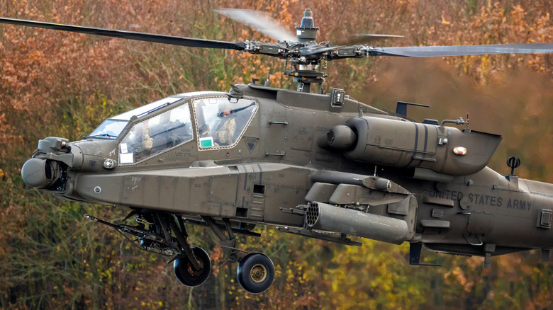 An AH-64 in a low hover