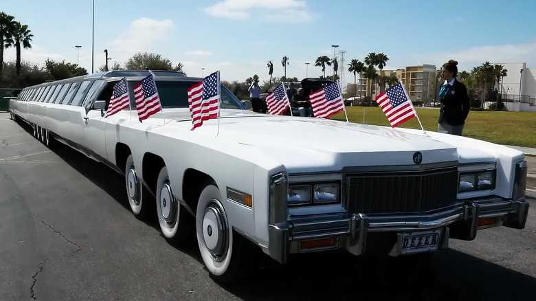 people admiring parked Americna Dream limo