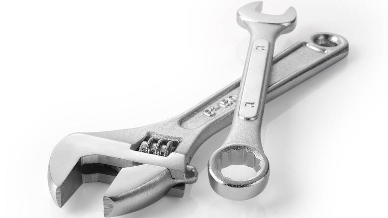 Combination wrench and adjustable wrench