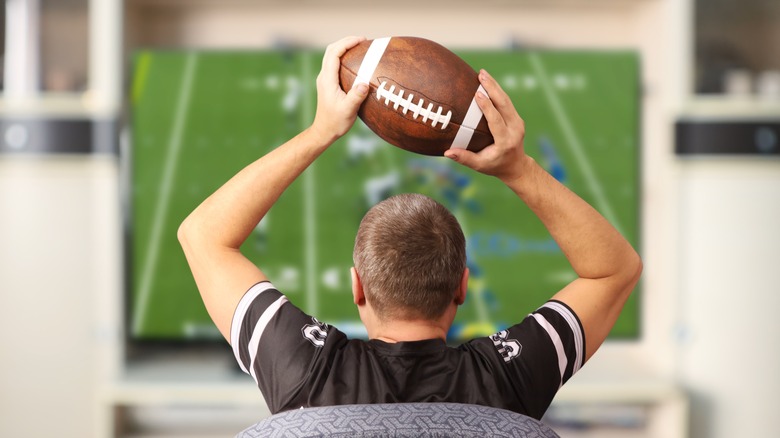 Man watching football