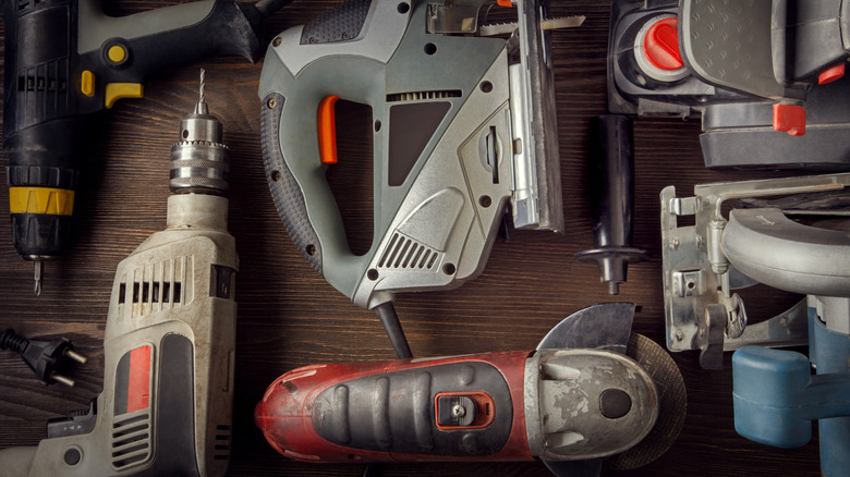 Collection of handheld power tools.