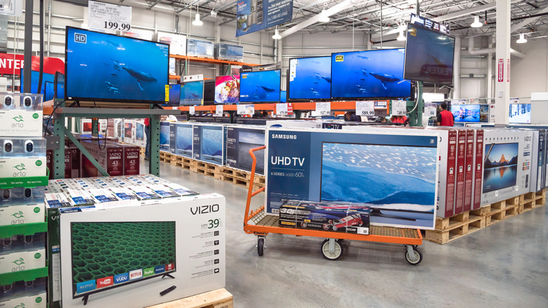 Costco TV department with a Samsung UHD TV in the foreground