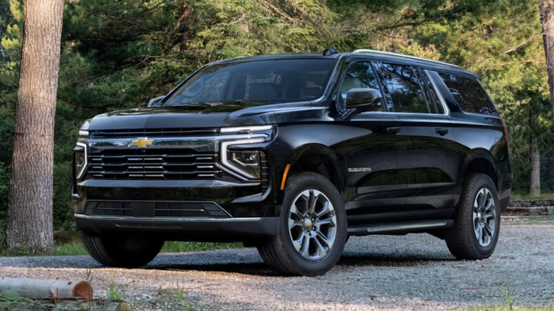 2025 Chevy Suburban in woods