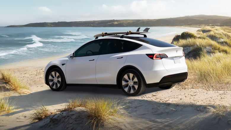 Tesla Model Y on beach