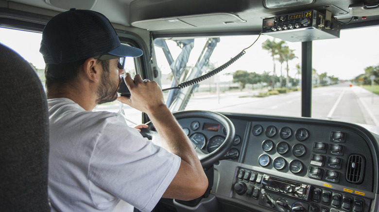 Driver using CB radio while driving
