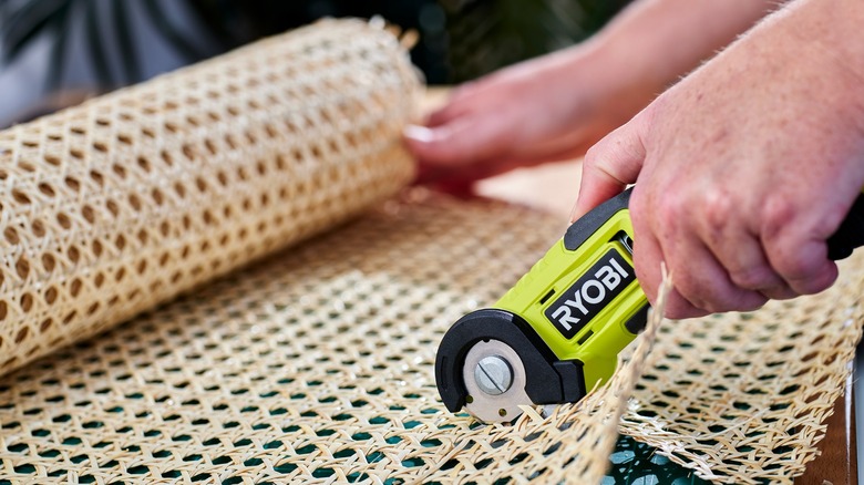 Ryobi USB Lithium Power Cutter cutting rug pad
