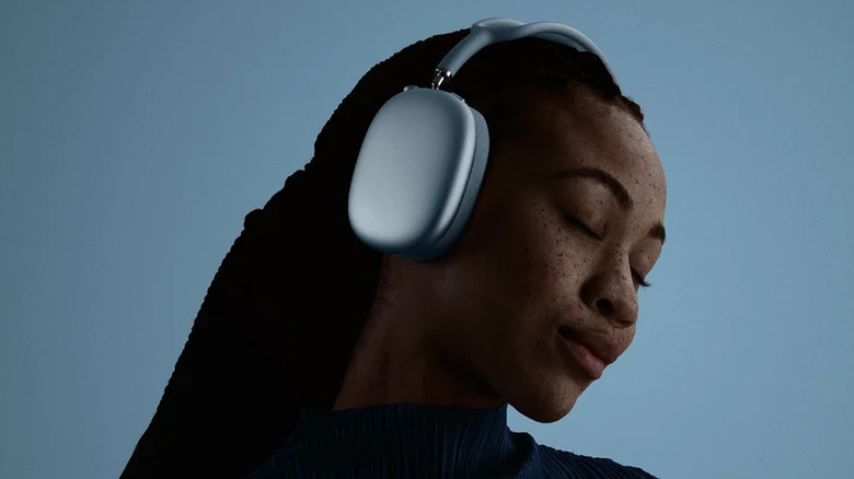 Person wearing the Apple AirPods Max 2 headphones