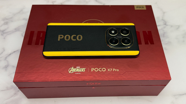 Poco X7 rests on an Iron Man Box