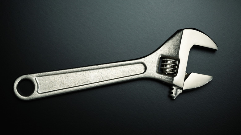 A crescent/adjustable wrench