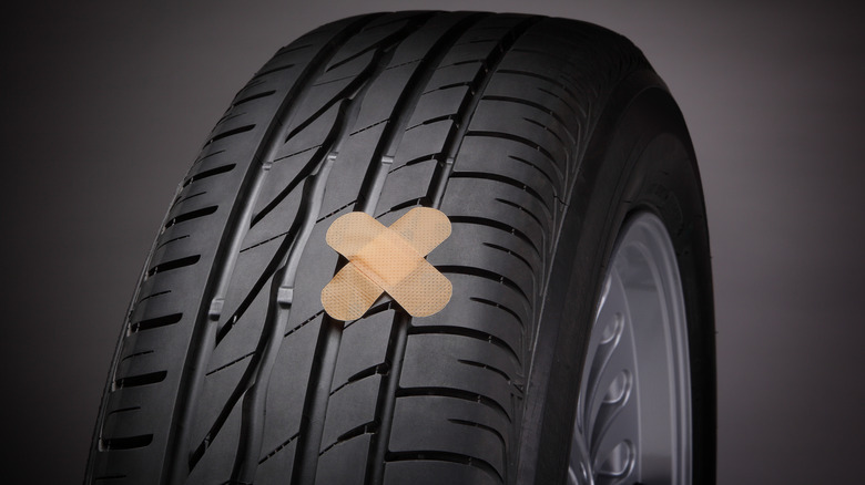 car tire with band aids
