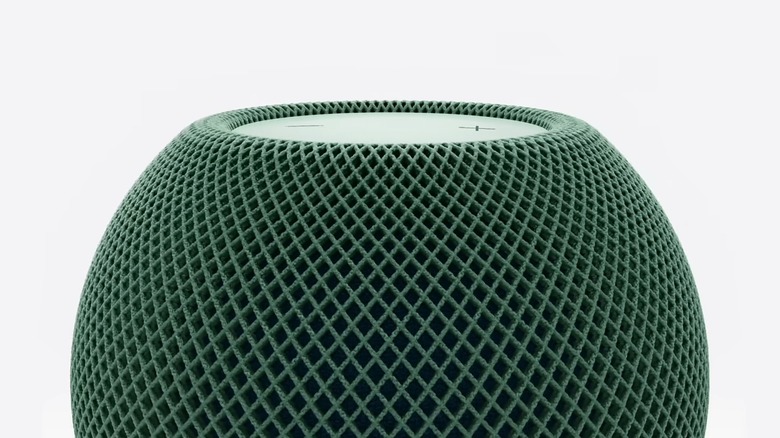 A green Apple HomePod Mini 2 against a white background.