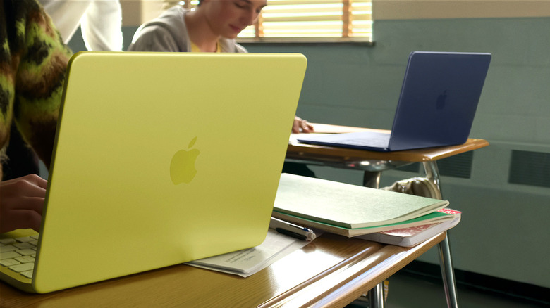 Students using Apple MacBook Neo in a classroom.