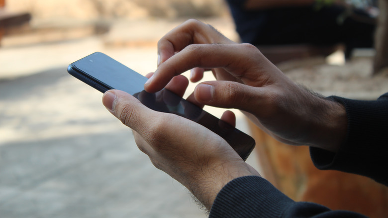 Person using Android phone