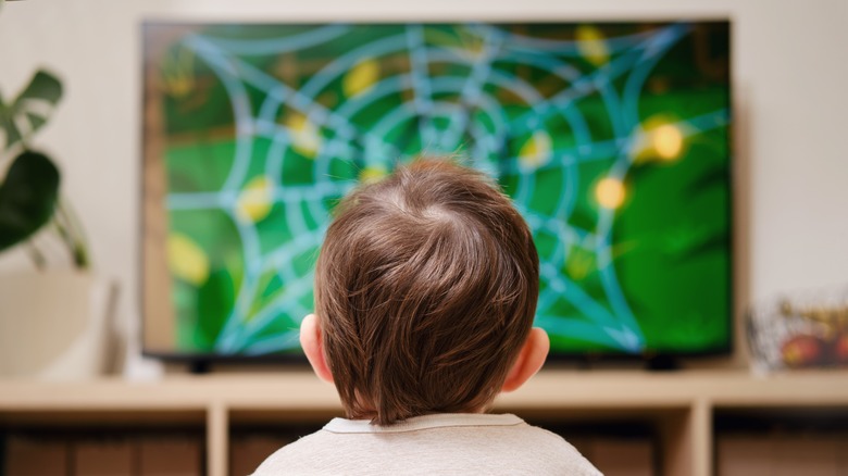 kid watching TV