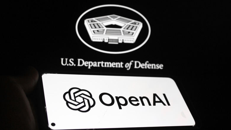 OpenAI logo on a smartphone screen and the United States Department of Defense logo in the background