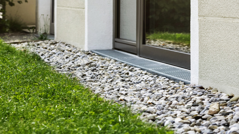 Gravel drainage along house foundation