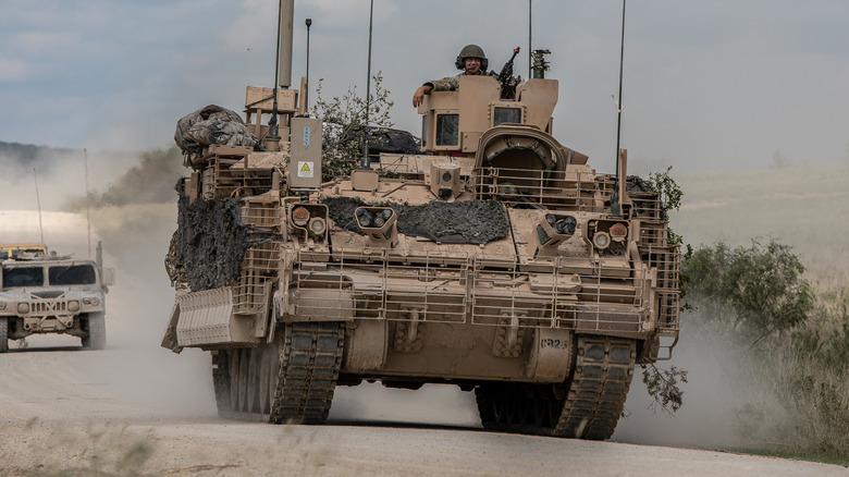 Action shot of the Armored Multi-Purpose Vehicle (AMPV) during field testing