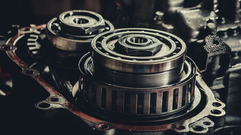 A closeup of a continuously variable transmission gearbox at a repair shop